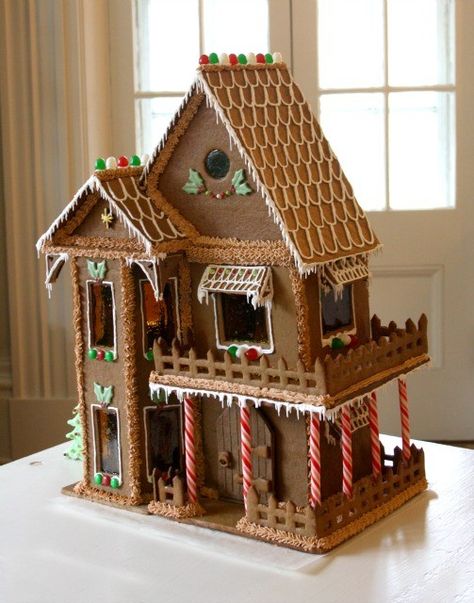 With Christmas on the way, you might already be thinking about making a fancy gingerbread house. All you need is a little inspiration, right? These amazing gingerbread houses are sure to get those creative juices flowing!   If you've ever been on Pinterest, you know how easy it is to get sidetracked.  I was supposed to be looking up a Christmas recipe but then a beautiful gingerbread house popped up on the page!  Before I knew it, I'd spent the better part of an hour looking at ginger... Amazing Gingerbread Houses, Small Gingerbread Houses, Gingerbread Castle, Gingerbread House Ideas, Cracker House, Rodjendanske Torte, Gingerbread House Patterns, Cool Gingerbread Houses, Gingerbread House Template