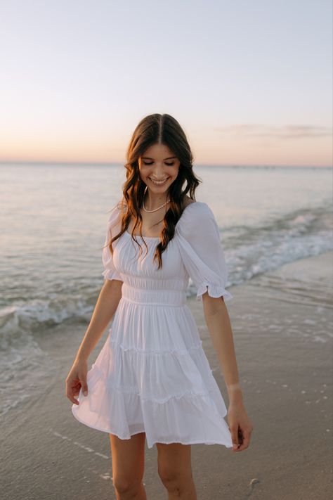 Beach Poses With Skirt, White Dress On Beach Photoshoot, Cute Dresses For Senior Pictures, Senior Photo White Dress, Summer Senior Pictures Outfits Dresses, Beach Photo Poses For Women, Sunset Beach Senior Photos, Beach Poses Photoshoot, Senior Picture Inspo Beach