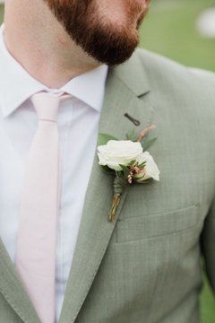 Groom In Sage Green, Groomsmen Attire Sage Green And Blush, Sage Green And Blush Mens Wedding Attire, Sage Tuxedo Wedding, Blush Pink And Sage Green Wedding Suits, Green Suit Pink Tie, Sage Suit Wedding, Sage Groom Suit, Sage Green Tuxedo Wedding