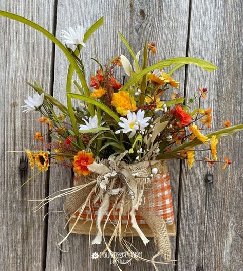 Tracy Wellmann on Instagram: "So many versions of the "smashed can" or "posey pockets" around now-a-days. 🍂🧡 Different size cans can really add to the beauty of the project. This started out as a gallon size can that my sweet mother saved for me. She actually gave me several so I'll be making more of these smashed can projects. 🎥 See how I did this craft in this video here: (link in bio to my youtube) https://youtu.be/2MT10OQjzNE?t=727 #smashedcan #poseypockets #fallcountrycrafts #fallcraft Smashed Can Craft, Can Projects, Fall Floral Decor, Rustic Crafts, Fall Country, Summer Wreaths, Country Crafts, Can Crafts, Country Charm