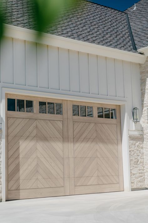 Nice Garage Doors, Double Garage Doors Ideas, Mountain Modern Garage Doors, Beach Garage Door, Light Oak Garage Door, Wood Garage Doors Gray House, Beach House Garage Doors, White House With Wood Garage Doors, Coastal Garage Doors