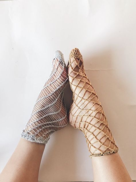 Last week, I posted the pattern to my knitted fishnet socks, and promised a crochet version for all the crocheters out there. The first half of this sock zoomed by, and I was super excited - it was looking fishnetty and was such bliss to crochet.     Then I got to the hem and got stuck for 4 days... the lurex just was not stretch enough to get over my instep and heel, or was too loose and floppy around my ankle. I tried working a front post/back post mock rib, but that was a failure t... Sparkly Fishnets, Crochet Socks Pattern, Fishnet Socks, Sock Knitting Patterns, Crochet Socks, Lace Socks, Sock Patterns, Crochet Shoes, Diy Knitting