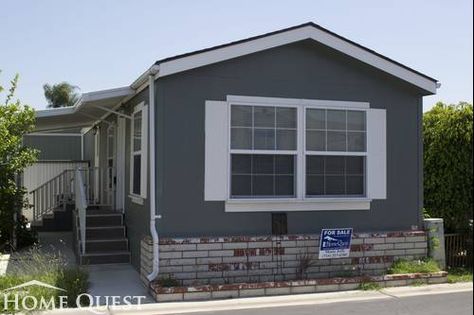 Mobile home dark gray exterior color with white trims Mobile Home Redo, Mobile Home Doors, Mobile Home Kitchens, Mobile Home Exteriors, Mobile Home Makeovers, Mobile Home Renovations, Single Wide Mobile Homes, Glass Railings, Manufactured Home Remodel