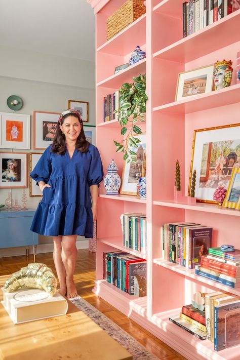 "As a historian of the early modern world, I love finding inspiration from the past. I would also say that my style is unapologetically feminine and playful since I have the luxury of living alone," she continues. "I believe your home should bring you joy!"  Credit: <a href="https://www.apartmenttherapy.com/authors/amanda-archibald">Amanda Archibald</a> Pink Bookcase, Traditional Bedrooms, Accent Wall In Kitchen, A Studio Apartment, Decorating Advice, Finding Inspiration, Living Alone, Dream Apartment, Living Room Colors