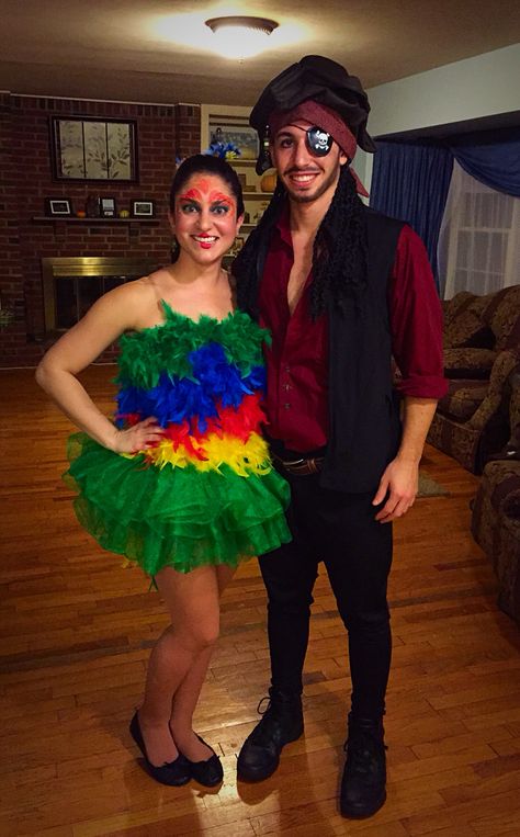 Pirate and Parrot Halloween costume! Couple costumes! Parrot And Pirate Costume, Pirate And Parrot Costume, Parrot Halloween Costume, Tom And Jerry Costume, Beer Pong Costume, Diy Couples Halloween Costumes, Halloween Costume Couple, Shaggy And Velma, Halloween Month