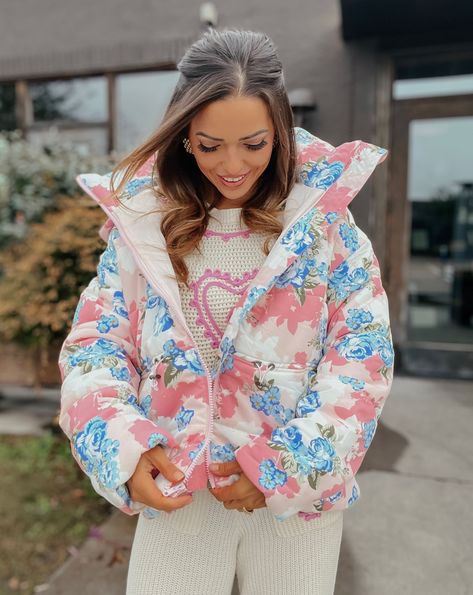 Stay cozy and stylish with the Bradley Floral Printed Puffer Jacket. This fun puffer features a unique floral print while keeping you warm on chilly days. Perfect for adding a playful touch to any outfit. Product Details: Features: Zipper. Hood. Adjustable waist. Fit: True to size. Model is 5'3 and wearing a size small. Fabric: Self- 100% nylon; Filler- 100% polyester; Lining- 100% polyester Care: Hand wash separately in cold water. Do not bleach. Hang to dry. Cool iron if needed. Dry clean (rec Floral Puffer Jacket, Printed Puffer Jacket, Fashion Sketchbook Inspiration, Cutest Clothes, Church Fits, Colorful Jacket, Cute Clothing Stores, Country Clothing, Fashion Sketchbook