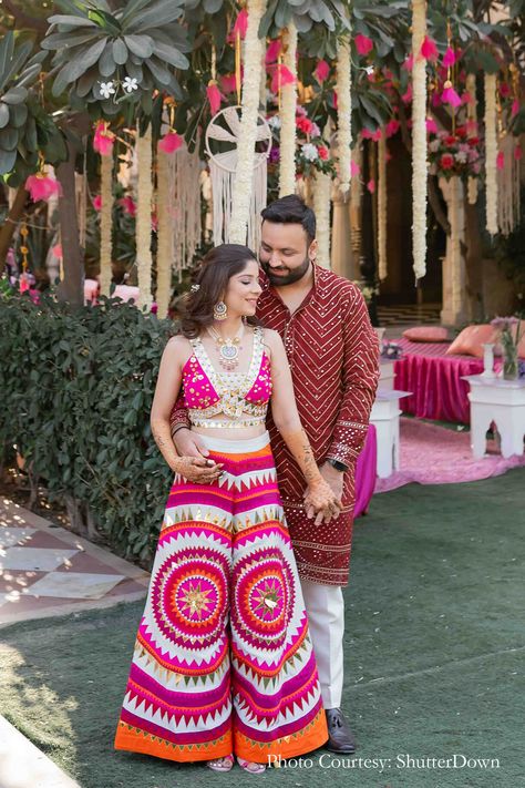 Nikita Vakadkar and Ashray Arora, Shahpura House, Jaipur | WeddingSutra Couple Mehendi Outfits, Mehndi Outfit For Couple, Couple Haldi Outfit Ideas, Sangit Outfit Ideas For Bride, Mehendi Night Outfit, Bride Mehendi Outfit, Mehendi Bride Outfit, Haldi Couple Outfits, Mehendi Outfit Ideas For Bride