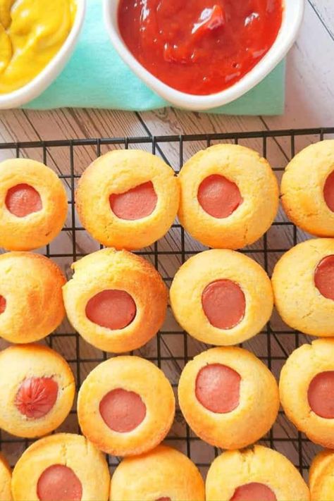 These mini corn dog muffins from scratch will be a hit with kids. This recipe whips up in 20 minutes and is perfect for snacks and easy school lunches. These fun treats combine the classic flavors of corn dogs with the convenience and portability of muffins. They are a great homemade corn dog muffin recipe. https://www.rfr.bz/plm7tjc Mini Corn Dog Muffins, Gluten Free Corn Dogs, Dog Muffins, Corn Dog Muffins, Mini Corn Dogs, Fun Dinner, Corn Dog, Corn Muffins, Muffin Mix