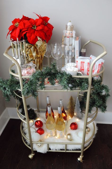 ‘Tis the season to be jolly! And I’m not just talkin’ Santa. 😉 A holiday bar cart is one of my favorite ways to add some Christmas cheer to our living + dining room. Plus, it’s great for small spaces and has functional storage! Here’s how to create your own! #holidaydecor #howto #barcart #holidayseason #holiday #homedecor #home Home Bar Christmas Decor, Apartment Living Room Christmas Decor, Christmas Wine Bar, Christmas Party House Decor, Apartment Christmas Party, Grinch Bar Carts, Christmas Bar Cart Ideas, Christmas Party Bar Setup, Holiday House Party