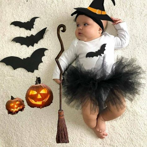 Happy spooky season! Make this year extra special as new parents with these easy and cute Halloween photoshoot ideas for babies. Baby Girl Halloween Photoshooting Ideas, Baby Witch Photoshoot, Spooky Baby Photoshoot, Cute Halloween Photoshoot Ideas, Halloween Monthly Baby Pictures, Halloween Baby Photoshoot Ideas, Cute Halloween Photoshoot, Ideas Halloween Disfraces, Halloween Photoshoot Kids