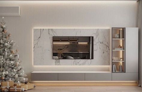 Simple Elegant Tv Wall Design, Marble Finish Tv Unit, Tile Behind Tv Wall, White Marble Tv Wall, Tv Wall Design White, White Tv Wall Design, Marble Tv Unit Living Rooms, Tv Wall Tiles Design, Tv Unit Marble Design