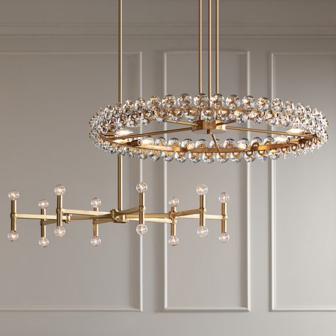 Upgrade your dining room with a trending soft gold finish chandelier or pendant lamp. Discover designs in eye-catching shapes that will be a gorgeous focal point and conversation starter. Featured Designs are available at Lamps Plus: Possini Euro Marya 37" Wide Satin Brass 16-Light Chandelier - Style # 15A85; Stiffel Fass 40" Wide Crystal Ring Round Soft Gold Pendant Light - Style # 816X0 Brass Chandelier Bedroom, Dinning Lighting, Modern Brass Chandelier, Gold Chandeliers, Modern Gold Chandelier, Gold Dining Room, Round Crystal Chandelier, Circular Chandelier, Chandelier Ideas