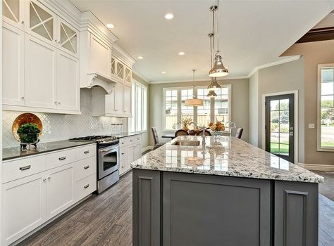 White kitchen cabinetry with grey accent island. Chrome hardware ... Gray Granite Countertops Kitchen, Rustic White Furniture, Gray Granite Countertops, White Cabinets With Granite, Grey Granite Countertops, Light Grey Kitchen Cabinets, Gray Island, Light Grey Kitchens, White Granite Countertops