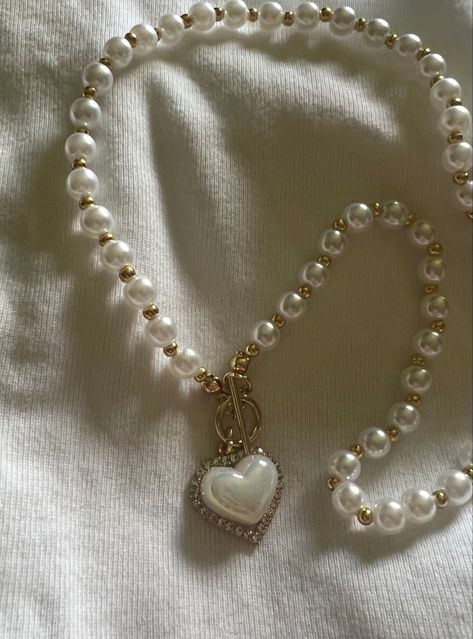 pearl necklace heart pendant jewelry aesthetic gold 24 karat Victorian Jewelry Aesthetic, Old Pearl Necklace, Heart Pearl Necklace, Pearl Heart Necklace, Pearl Necklace Aesthetic, Pearl Jewlery, Vintage Pearl Jewelry, Pearl Aesthetic, Puffy Heart Necklace