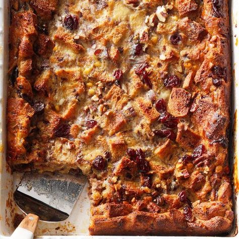 Cranberry Amaretto Bread Pudding Recipe: How to Make It Bagel Bread Pudding, White Chocolate Bread, Eggnog Bread Pudding, Cinnamon Bread Pudding, Cinnamon Bagels, White Chocolate Bread Pudding, Bagel Bread, White Chocolate Sauce, Pumpkin Bread Pudding