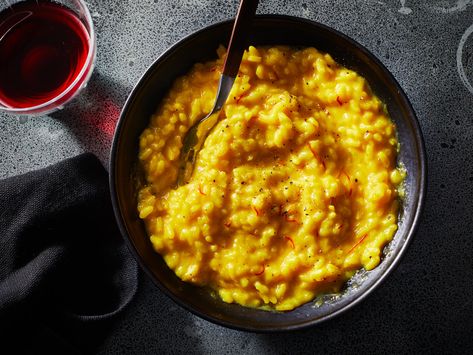 Saffron, wine, and beef tallow enrich this golden risotto with comforting flavor. Get the recipe at Food & Wine. Zucchini Risotto, Bacon Risotto, Saffron Risotto, Vegetarian Risotto, Risotto Milanese, Creamy Zucchini, Mushroom Risotto Recipes, Chicken Risotto, Butternut Squash Risotto