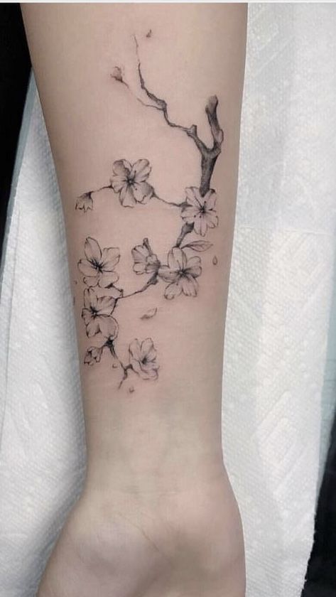 Cherry Blossom Tattoo Calf, Scar Cover Up Tattoos For Women, Cherry Blossom Tattoo Black And White, Black Cherry Blossom Tattoo, Japanese Cherry Blossom Tattoo Sleeve, Arm Tattoos To Cover Scars, Almond Blossom Tattoo, Minimalist Arm Tattoos For Women, Shaded Flower Tattoo