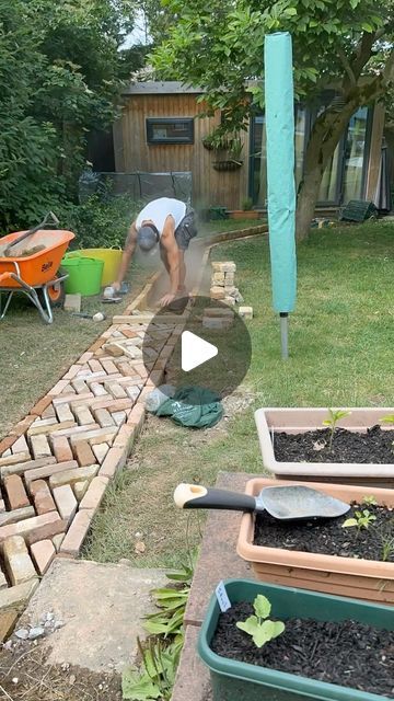 Tom Hall on Instagram: "Reclaimed bricks being laid.  3 slightly different sizes of bricks being laid so abit difficult to get it all matching up but we’re getting round it :)  Any enquiries please get in touch below   📞- 07464 976533  📩 - tgmlandscapes.info@gmail.com  💻 - www.tgmlandscapes.net  #bricks #reclaimed #path #herringbone #lawn #grass #carpenter #summer #gardener #gardening #landscape #landscaper #landscaping #garden #builder #hardwork #landscapegardening #sun #weather #hardwork #building #brickie #bricklayer #driveway #sand #cement #bricks #paving #progression #business" Brick Projects Outdoor, Reclaimed Brick Pathway, Hoggin Path Garden, Brick Path Garden, Pavement Design Paving Pattern, Walking Path Ideas, Reclaimed Brick Garden, Brick Garden Path, Reclaimed Brick Patio