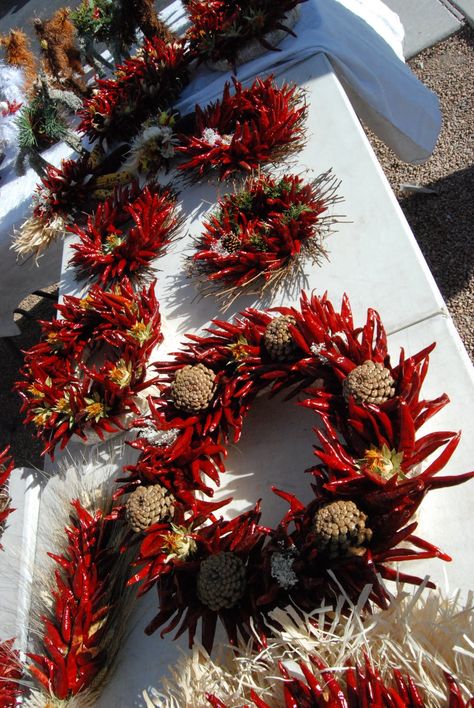 Santa Fe Daily Photo: A Santa Fe Christmas Wreath. This is a beautiful place to be during December. Santa Fe Christmas, Southwest Christmas Decor, Chile Ristra, Chili Peppers Decor, Santa Fe Decor, Southwest Christmas, Christmas Pine Wreath, Traditional Christmas Wreath, Mexico Christmas