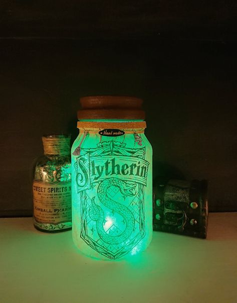 Slytherin House Pride light up jar/ night light/ Slytherin decor/ Gift present idea/ Friendship Birthday Wedding Anniversary by Grobblenots on Etsy https://www.etsy.com/listing/636987622/slytherin-house-pride-light-up-jar-night Slytherin Decor, Ravenclaw Gifts, Hogwarts Decor, Harry Potter Weihnachten, Harry Potter Light, Ravenclaw Crest, Imprimibles Harry Potter, Cumpleaños Harry Potter, Slytherin And Hufflepuff