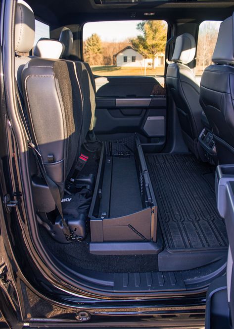 The Ford #F150Lightning under-seat storage provides ample space to store all your gear conveniently and securely. Discover more about the all-electric truck at #BillBrownFord, Michigan's top Ford Dealership! #ElectricTruck #EVs #ElectricVehicles #FordDealership Lightning Interior, F150 Interior, Livonia Michigan, Electric Pickup, Electric Truck, Built Ford Tough, Seat Storage, Heated Seat, Streamer Dr