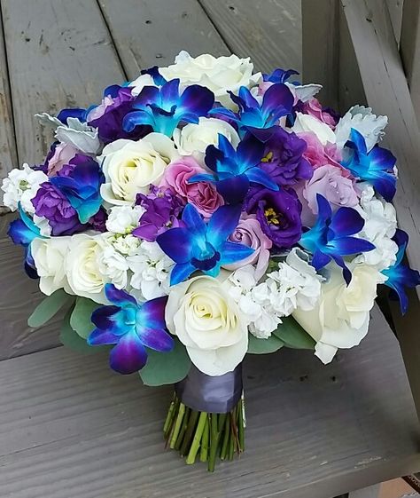 Blue orchid bouquet Blue Orchid Centerpieces Wedding, Blue Orchid Bouquet, Purple Orchid Bouquet Gift, Blue Orchid Wedding, Buddhist Wedding, Blue And Purple Orchid Bouquet, Orchid Bridal Bouquets, Blue Orchid Flower, Orchid Wedding Cake