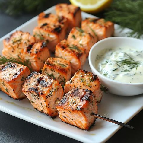 cookefast | Grilled Salmon Skewers with Creamy Dill Yogurt Sauce | Facebook Grilled Salmon Skewers With Creamy Dill Sauce, Dill Yogurt Sauce, Salmon Kabobs, Yogurt Dill Sauce, Yogurt Dipping Sauce, Salmon Skewers, Creamy Dill Sauce, Airfryer Recipes, Dill Sauce