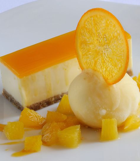 Matthew Tomkinson's recipe for passion fruit and white chocolate cheesecake will impress any guest. The orange sorbet adds a wonderful freshness to this decadent dessert, and is guaranteed to please. Granitas, Masterchef Recipes, Dessert Design, Passionfruit Recipes, Veggie Recipe, Orange Sorbet, Chocolate Cheesecake Recipes, White Chocolate Cheesecake, Great British Chefs