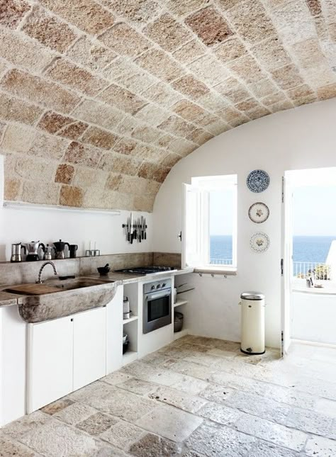 Kitchen in Puglia, Italy via Kinfolk | Remodelista Italian Kitchen Design, Stone Walls Interior, Homes In Italy, Smart Tiles, Italian Home, Rustic Kitchen Decor, Italian Kitchen, Stone Walls, Design Del Prodotto