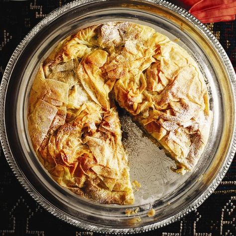 Moroccan-inspired Bastilla — a phyllo-crusted pie stuffed with chicken, almonds and herbs — and more dishes from around the globe at Chatelaine.com. Moroccan Dinner Party, Moroccan Dinner, Phyllo Pastry, Chicken Pie Recipe, Dinner Party Themes, Dinner Party Menu, Cooking Recipes Healthy, Easy Meal Plans, Moroccan Food