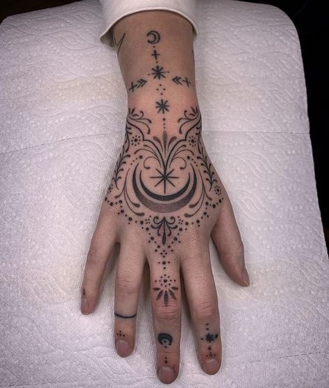 #tattoo, #tattoos, #inked, #tattooart, #tattooedwomen, #tattooedguys, #tattooinspiration, #tattooideas, #tattooworldwide, #tattoosociety, #InkLaughs, and #TattooFails​ Small Ornamental Tattoo Hand, Romani Hand Tattoo, Norse Hand Tattoo For Women, Witchy Henna Tattoos, Chandelier Hand Tattoo, Jewelry Hand Tattoo, Hand Tattoos Witchy, Wiccan Hand Tattoos, Mystical Hand Tattoo