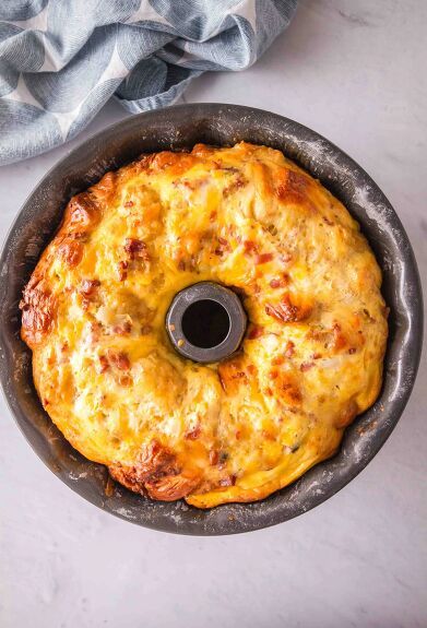 This Breakfast Bundt Cake recipe is an absolute hit with the family! With biscuits, bacon, tater tots, eggs, and seasoned with dijon mustard, onions, paprika, and cheddar cheese, it’s the perfect breakfast delight. Trust me, this is the tastiest way to kickstart your day! Why You’ll Love This Bundt Cake Breakfast Recipe Packed with flavor: the combination of bacon, onions, paprika and dijon mustard gives this bundt cake a savory depth that’s hard to resist. Hear… Bacon Tater Tots, Tiger Butter Fudge Recipe, Breakfast Bundt, Breakfast Bundt Cake, Italian Appetizers Easy, Bundt Pan Recipes, Vegan Zucchini Bread, Baked Pesto Chicken, Bundt Cake Recipe