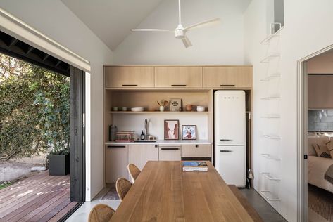 The ADU's kitchenette is tucked into one side of the structure, with a ladder leading to a carpeted playroom for the kids. Backyard Garage, Open Cabinets, Exclusive Home, House Design Photos, Modern Cabin, Kitchen Photos, Beach Home, Prefab Homes, Japanese House