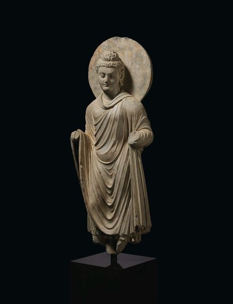 A GRAY SCHIST FIGURE OF BUDDHA SHAKYAMUNI, ANCIENT REGION OF GANDHARA, 3RD-4TH CENTURY CE | Christie's Gandhara Art, Historical Sculptures, Standing Buddha, Buddha Garden, Buddha Figures, Mahayana Buddhism, Shakyamuni Buddha, Buddha Sculpture, Egypt Art