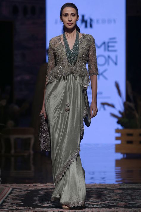 Straight from the Runway | Handcrafted to blend in every celebratory occasion, through seasons, every creation in Jayanti Reddy's Lakme Fashion Week collection is a masterpiece. . WhatsApp us now for personal shopping experience! +918488070070 Indian Runway Fashion, Lengha Blouse Designs, Jayanti Reddy, Saree Wearing Styles, Lehenga Blouse Designs, Draping Fashion, Embroidered Saree, Stylish Blouse Design, Designer Blouse Patterns