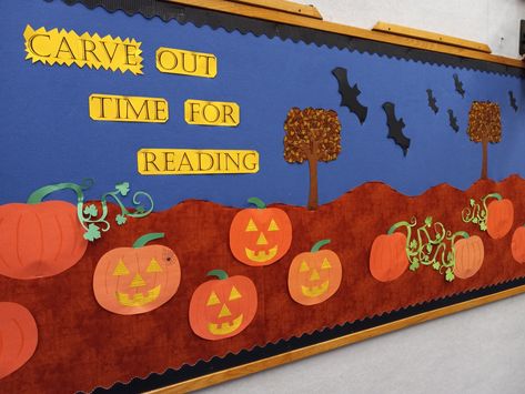 Fall Bulletin board "Carve out time for Reading:" fabric background with paper pumpkins, vines, jack-o-lanterns, trees & bats. Fall Library, Reading Bulletin Board, Fall Bulletin Board, Library Bulletin Board, Reading Bulletin Boards, Fall Bulletin Boards, Paper Pumpkins, Library Boards, Fabric Background