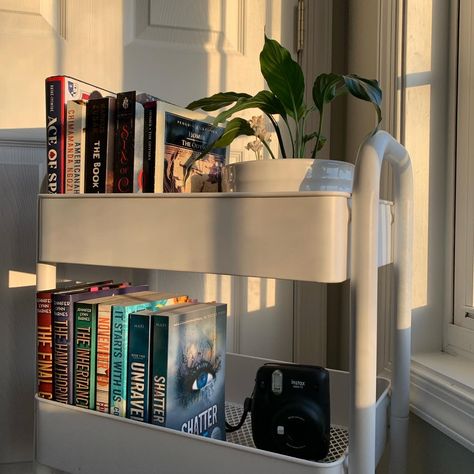 Clean Bookshelf, Book Trolley Aesthetic, Aesthetic Book Cart, Books On Nightstand, Reading Cart, Book Trolley, Book Carts Aesthetic, White Bookshelf, Book Carts