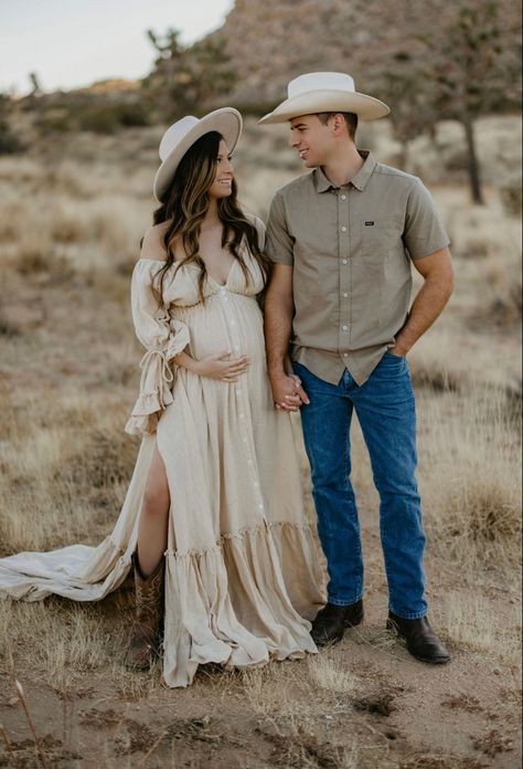 western, desert, boots Ranch Maternity Photoshoot, Maternity Clothes For Photo Shoot What To Wear Color Schemes, Lukalula Maternity Dress, Texas Maternity Photoshoot, Maternity Pictures With Hat, Boho Style Maternity Shoot, Vaquera Maternity Shoot, Maternity Dress Photography, Vaquero Maternity Shoot