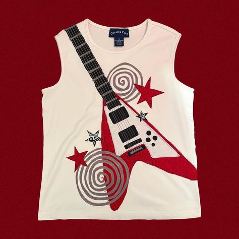 latest shirt design!! im planning on making more guitar shirts in the future bc i’m obsessed with how this one turned out♥️🤍🖤🩶 #upcycling #upcycledartist #upcycle #upcycled #upcycledclothing #thriftflip #flyingvguitar #flyingv #applique #appliqueshirt #dadrock #rockandroll #rock #music #guitar Diy Band Shirt Ideas, Diy Band Shirt, Band Shirt Ideas, Flying V Guitar, Rock Tshirt, Patchwork Shirt, Patches Shirt, Thrift Flip, Applique Shirts