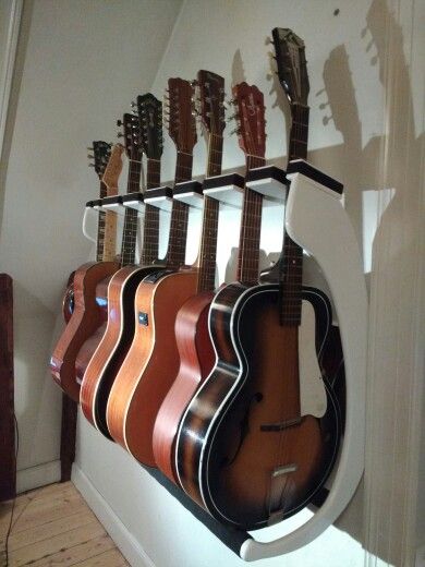 Even more guitar rack Guitar Rack Wall, Diy Guitar Rack, Guitar Rack Diy, Guitar Storage Ideas, Guitar Display Ideas, Guitar Storage Cabinet, Guitar Storage, Guitar Display, Home Music Rooms