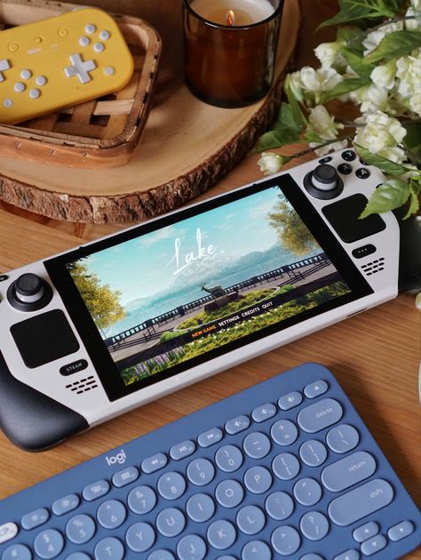 Steam Deck Setup, Steam Deck Oled Aesthetic, Steam Deck Aesthetic, Handheld Aesthetic, Switch Aesthetic, Lake Games, Cozy Gamer, Steam Games, Cozy Gaming