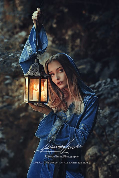 85 mm lens - Dark elf woman with lantern by Lorenzo Gulino / 500px Person Holding Lantern Reference, Dark Elf Woman, Lantern Photoshoot, Elf Photoshoot, Holding Lantern, Lantern Photography, Elf Woman, Girl Symbol, Lantern Drawing