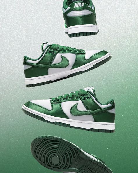 The classic Nike Dunk Low receives a makeover with this new ""Satin Green"" release. Shimmering panels replace traditional leather on the forefoot, tongue, and heel, adding a touch of elegance to Peter Moore's classic design, making it the latest addition to the brand's new lifestyle lineup. How do you feel about the latest satin Nike Dunk trend? Nike Jordan Aesthetic, Jordans Aesthetic, Chanel No5, Shoe Poster, Fashion Poster Design, Shoes Ads, Jordan Sneaker, Fashion Layout, New Lifestyle