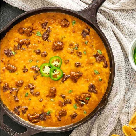 Wow your guests with this easy and flavorful chili cheese dip recipe. Made with Hormel chili and Velveeta cheese, it's the perfect party appetizer. Hormel Chili Cheese Dip, Chili Dip Recipes, Chili Cheese Dip Recipes, Velveeta Cheese Dip, Chili Cheese Dip, Hormel Chili, Cheese Dip Recipe, Chili Cheese Dips, Easy To Make Appetizers