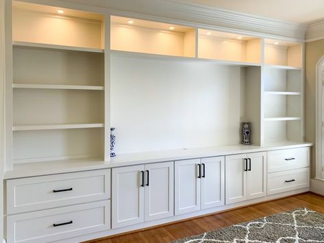 Entertainment Center Ideas Basement, Custom Made Entertainment Center, Den Built In Cabinets, Basement Family Room Storage, Media Center Bookshelves, Built In Cabinets With Bookshelves, Built In With Open Shelving, Custom Wall Cabinets Built Ins, Den Built Ins With Tv