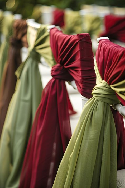 Dreaming of a Tuscan-themed wedding? 🍇🌿 Transform your venue with these stunning chair covers in olive green and wine red. Channel the romance of Italy's vineyards for a day to remember! #WeddingInspiration #TuscanWedding #ChairCovers #WeddingDecor #EventDesign #RusticCharm #ItalyWedding #VineyardVibes Wine Red And Sage Green Wedding, Maroon And Olive Green Wedding, Green And Wine Wedding, Green And Red Wedding Theme, Red And Sage Green Wedding, Green And Maroon Wedding, Maroon Wedding Theme, Olive Green Weddings, Red Wedding Theme