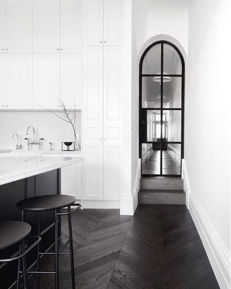 Black chevron looks great in a white kitchen Monochrome Living, Pintu Interior, Hardwood Floors Dark, Interior Minimalista, Contemporary Kitchen Design, Style At Home, Contemporary Kitchen, House Inspo, The Doors