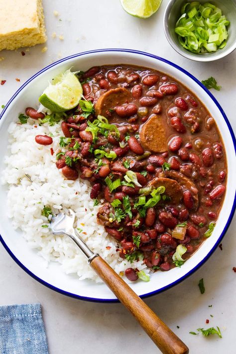 Instant Pot Red Beans and Rice features red beans cooked from scratch with veggies, flavorful cajun spices, vegan sausage, and served with rice for a healthy & hearty lunch, dinner or meal prep! Gluten free, oil free and low fat vegan recipe. Vegan Red Beans And Rice Instant Pot, Cuban Red Beans, Vegan Red Beans And Rice, Cuban Rice And Beans, Soak Beans, Cuban Rice, Simple Veganista, Cajun Spices, Instant Pot Recipes Easy