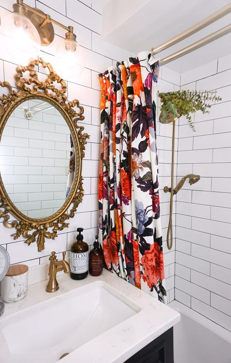 Eclectic Boho Colorful Small Bathroom | Gold Antique Mirror and Fixtures | Bold Floral Shower Curtain | Floor to Ceiling White Subway Tile | Eucalyptus Shower Head Colorful Small Bathroom, Vintage Gold Mirror, Black White Bathrooms, Beige Bathroom, Bathroom Decor Apartment, Bedroom Renovation, Floral Shower Curtains, Apartment Bathroom, Bathroom Redo