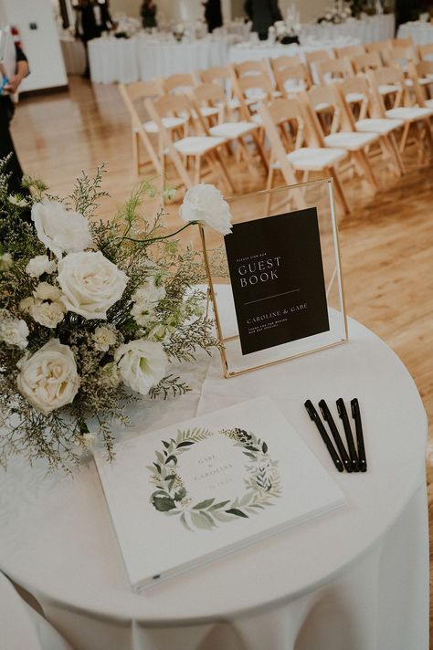 Black Tie Wedding with simple modern guest book table. #blacktiewedding #luxewedding #guestbook #guestbooktable #modernguestbooktable #guestbookideas #weddingreception #weddingdesign #modernweddingideas #modernweddinginspo #modernwedding #blackandwhitewedding #whiteflorals #whiteweddingflowers #weddinginspo #weddinginspiration Modern Wedding Gift Table, Wedding Guest Book Display, Welcome Table Wedding Entrance Guest Books, Simple Guest Table Wedding, Card Table At Wedding, Modern Wedding Guest Book Table, Wedding Sign In Table Decor, Wedding Book Signing Table, Guest Book Table Sign